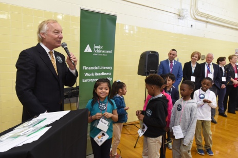 Comptroller Peter Franchot collects "Taxes" from Beaver Run Elementary Second Graders, who learned about taxes from volunteers from Avery Hall Insurance Group during Leadership Day.